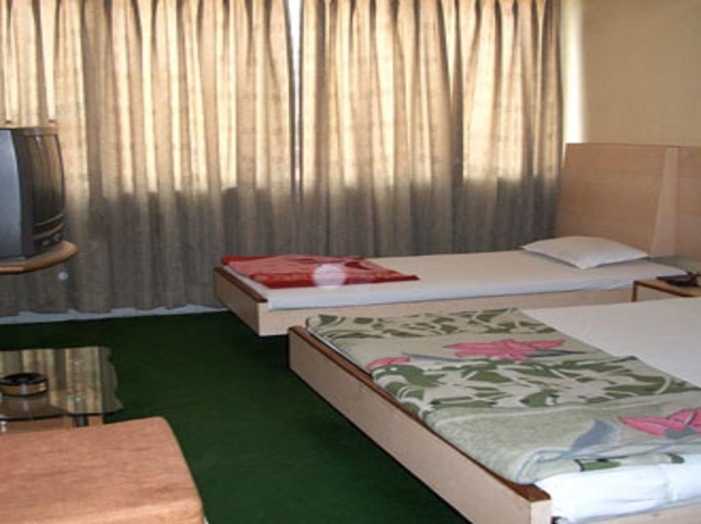 Hotel Tourist International Pune Esterno foto
